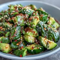 Bright Smashed Cucumber and Avocado Salad with sesame, vibrant and fresh for lunch.